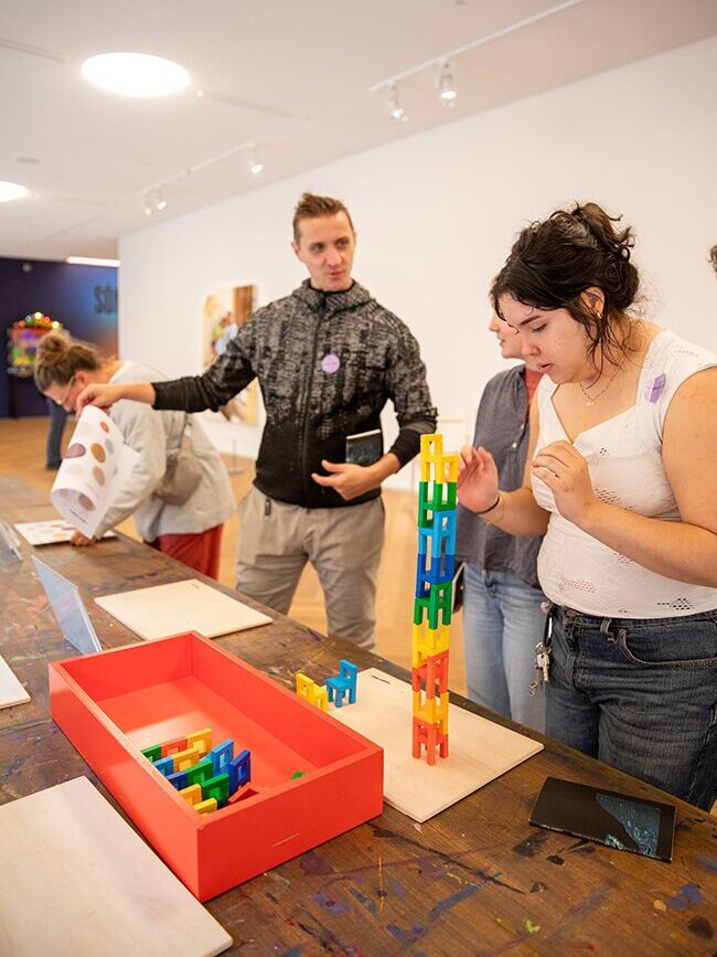 Robert and Betsy build with colorful blocks in the Moderna Museet