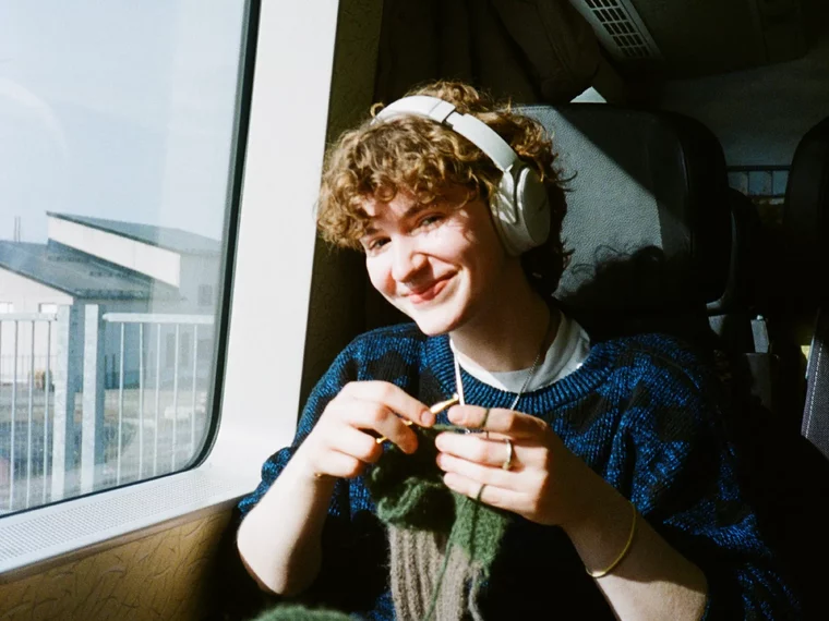 SP24_SlowTravel_Day1_Jordyn-on-Train_GraceMcLarty-2